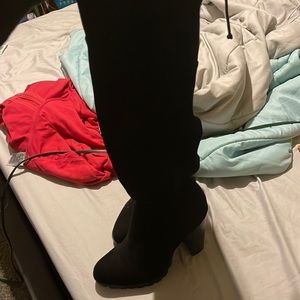 These are brand new never worn over the knee boots with a heel